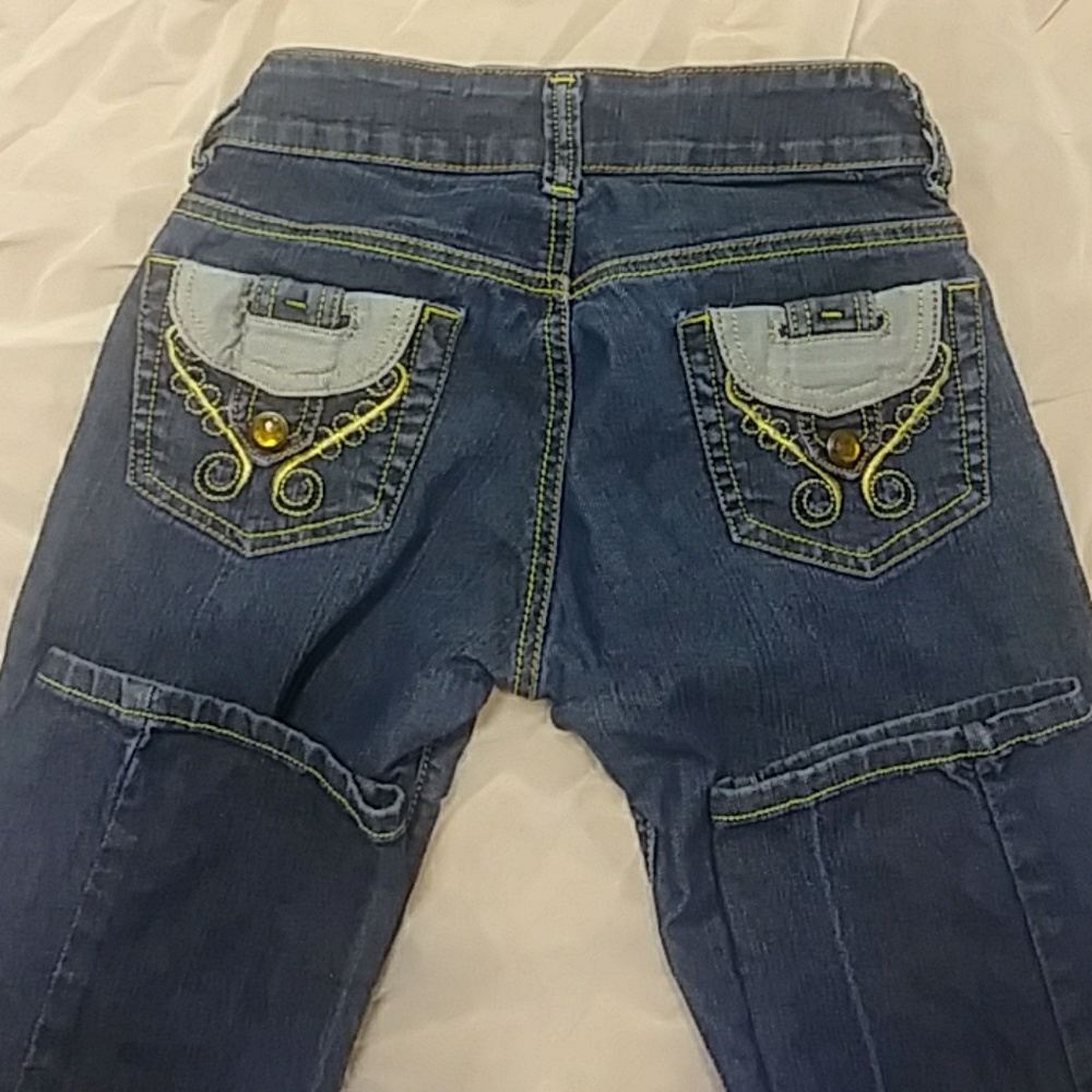 DOLCE AMARO Womens jeans 29/31 LOW RISE Denim distressed demolished Ripped up
